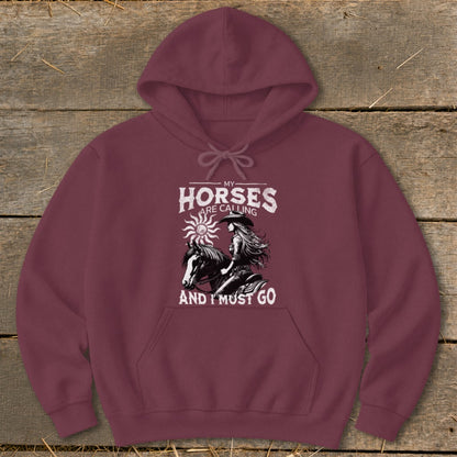 Maroon hoodie with "My Horses Are Calling And I Must Go" text and horse riding graphic.