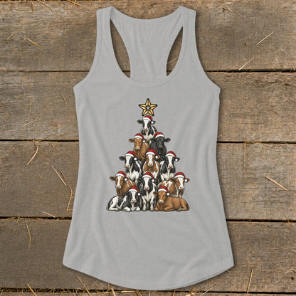 Cow Christmas tree with Santa hats and a star on a grey tank top.