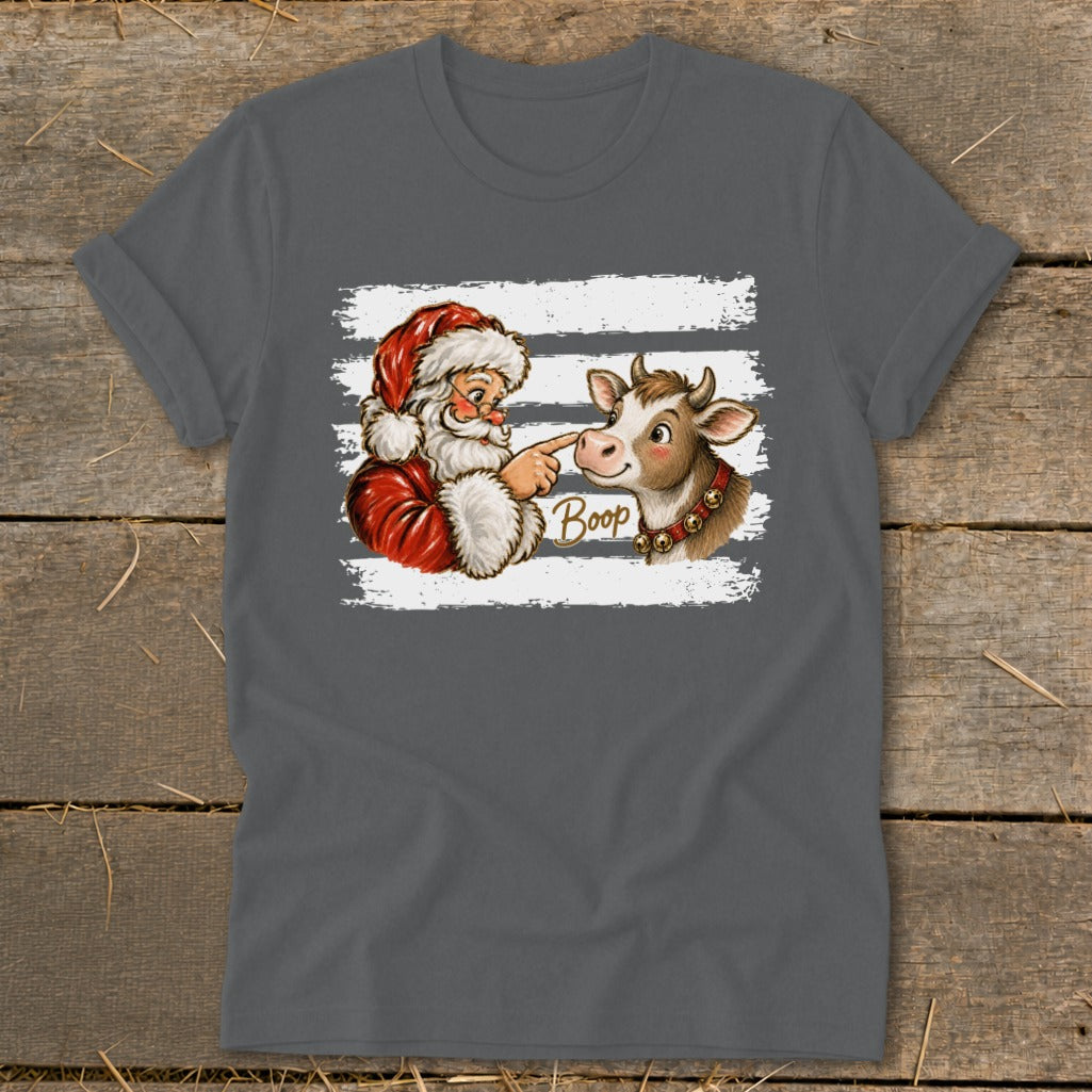 Santa boops a cow's nose with the word "Boop" written in gold text.