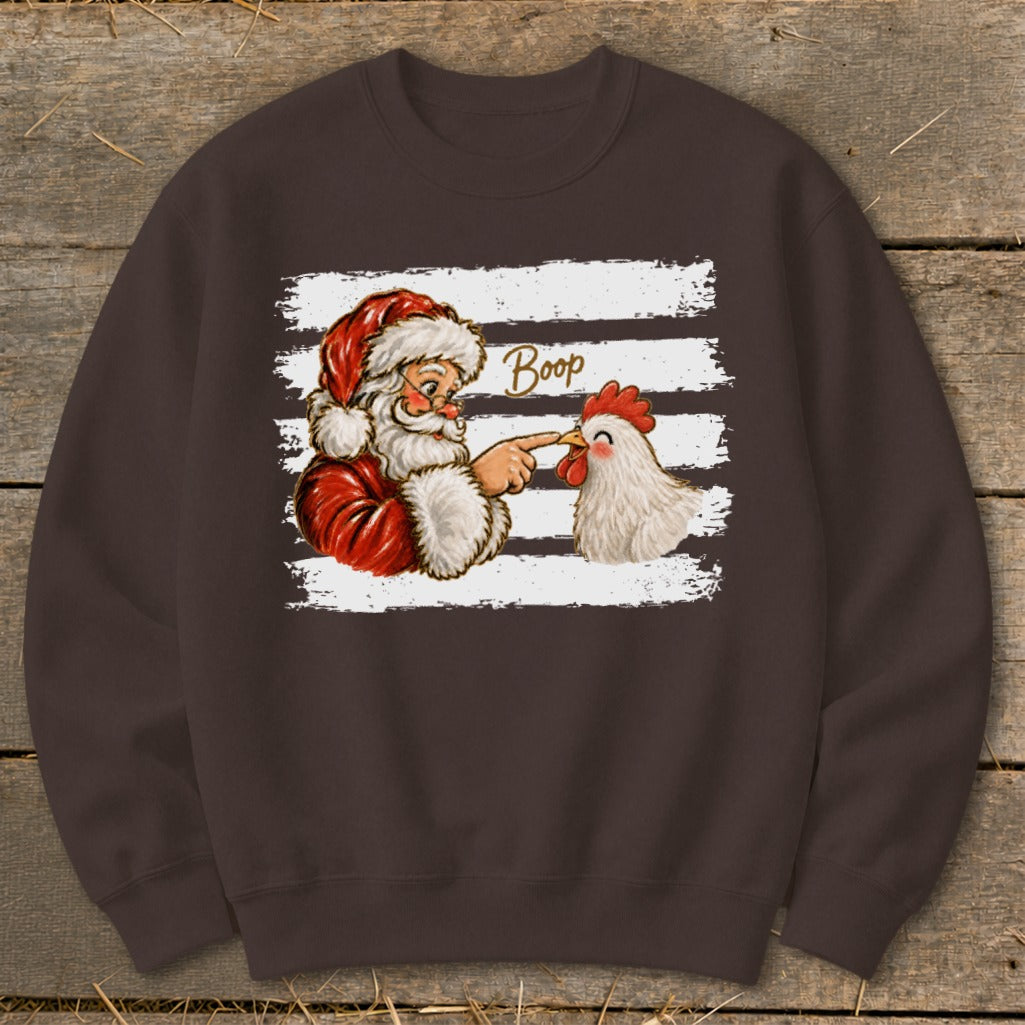 Santa booping a chicken with "Boop" text on a distressed striped background.