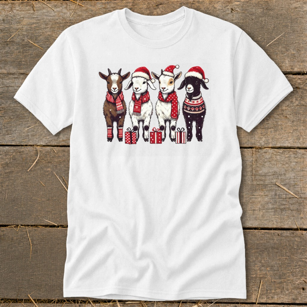 Four goats in Christmas hats and sweaters stand with presents.