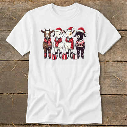 Four goats in Christmas hats and sweaters stand with presents.