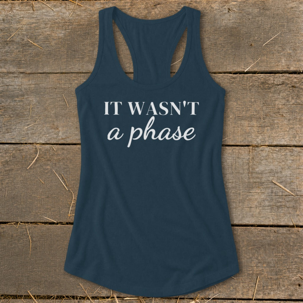 Navy racerback tank top with white text "IT WASN'T a phase."