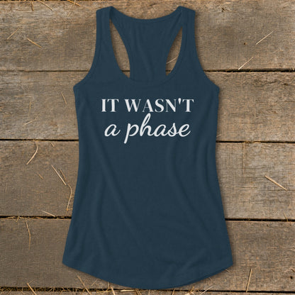 Navy racerback tank top with white text "IT WASN'T a phase."