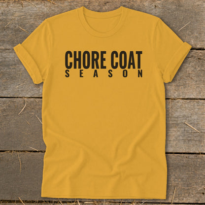 Yellow t-shirt with black text reading "CHORE COAT SEASON".