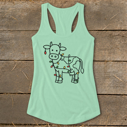 Mint green tank top with a cartoon cow wrapped in colorful Christmas lights.