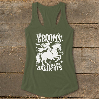 Green tank top with white graphic of a witch on a horse and text "Brooms are for amateurs".