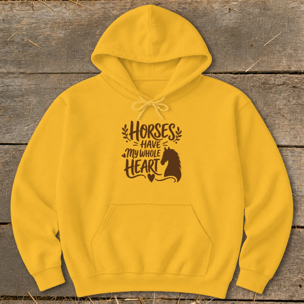 Yellow hoodie with brown text and horse silhouette reading "Horses Have My Whole Heart".