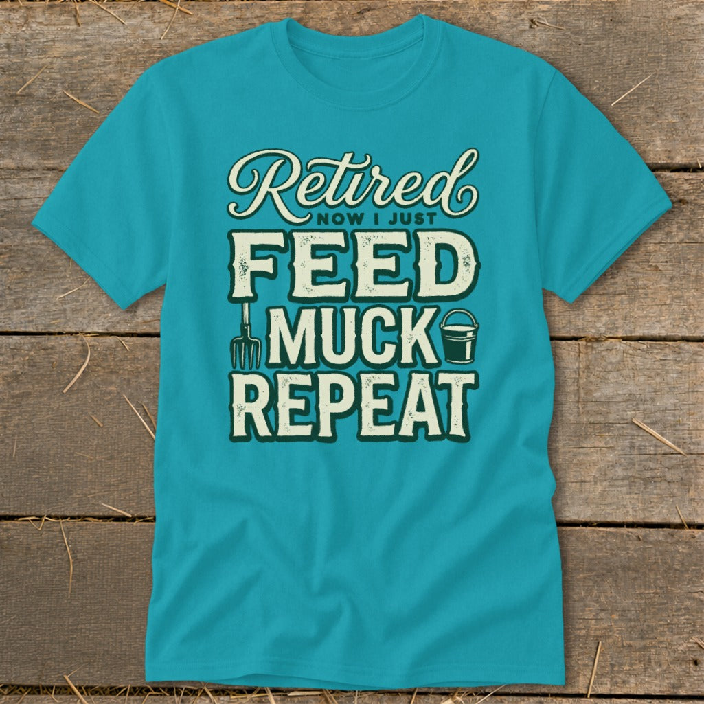 Teal t-shirt with "Retired NOW I JUST FEED MUCK REPEAT" text and graphics.