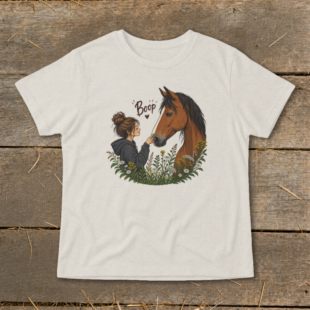 Illustration of a girl and horse with the word "Boop" and a heart.