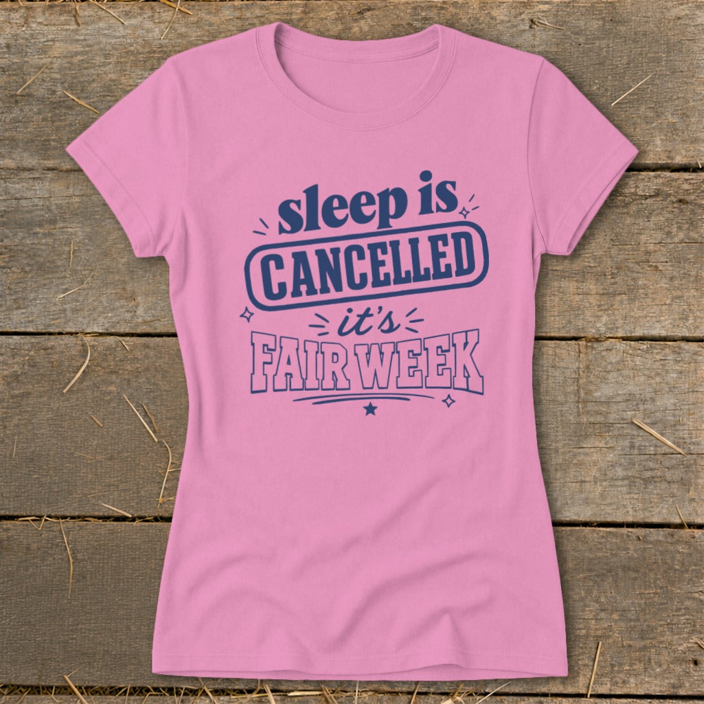 Pink t-shirt with navy blue text: "sleep is CANCELLED it's FAIR WEEK".
