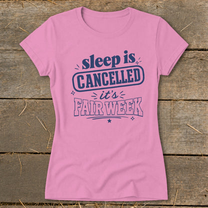 Pink t-shirt with navy blue text: "sleep is CANCELLED it's FAIR WEEK".