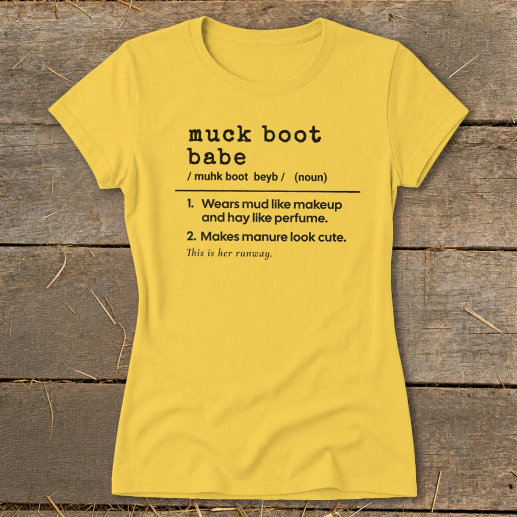 Yellow t-shirt with "muck boot babe" definition and humorous descriptions.