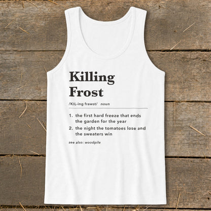 A white cotton tank top with black text defining the term Killing Frost laid flat on a wooden surface.