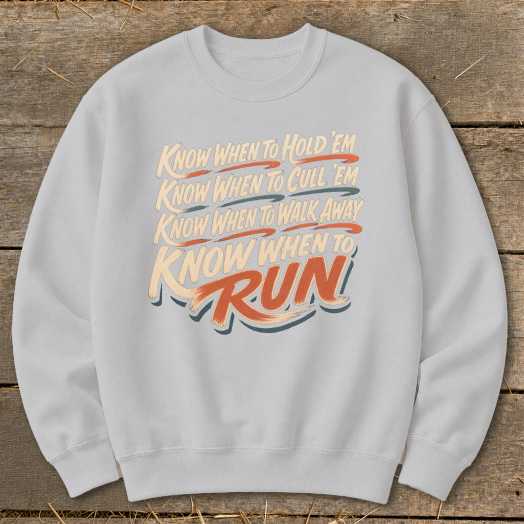 Light gray sweatshirt with text: "Know when to hold 'em, know when to cull 'em, know when to walk away, know when to run."