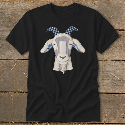 Black t-shirt with a fabric applique of a smiling goat's head.