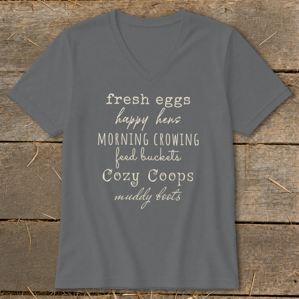 Gray v-neck t-shirt with "fresh eggs happy hens" and "Cozy Coops muddy boots" text.