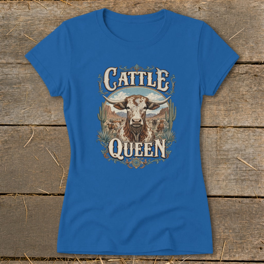 Blue women's t-shirt featuring a vintage western graphic with a longhorn steer and text reading "CATTLE QUEEN".