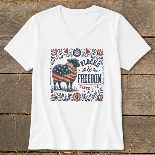 White v-neck shirt with a sheep in American flag pattern, "Flocks & Freedom since 1776".
