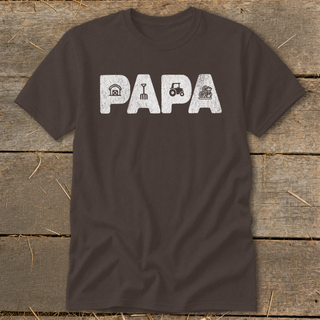 Brown t-shirt with distressed white text "PAPA" and farm icons.