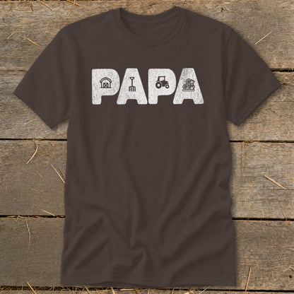 Brown t-shirt with distressed white text "PAPA" and farm icons.