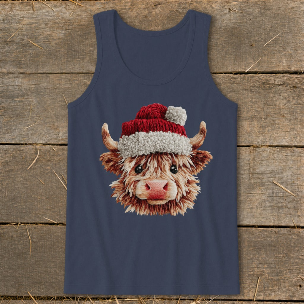 Highland cow with a Santa hat on a navy blue tank top.
