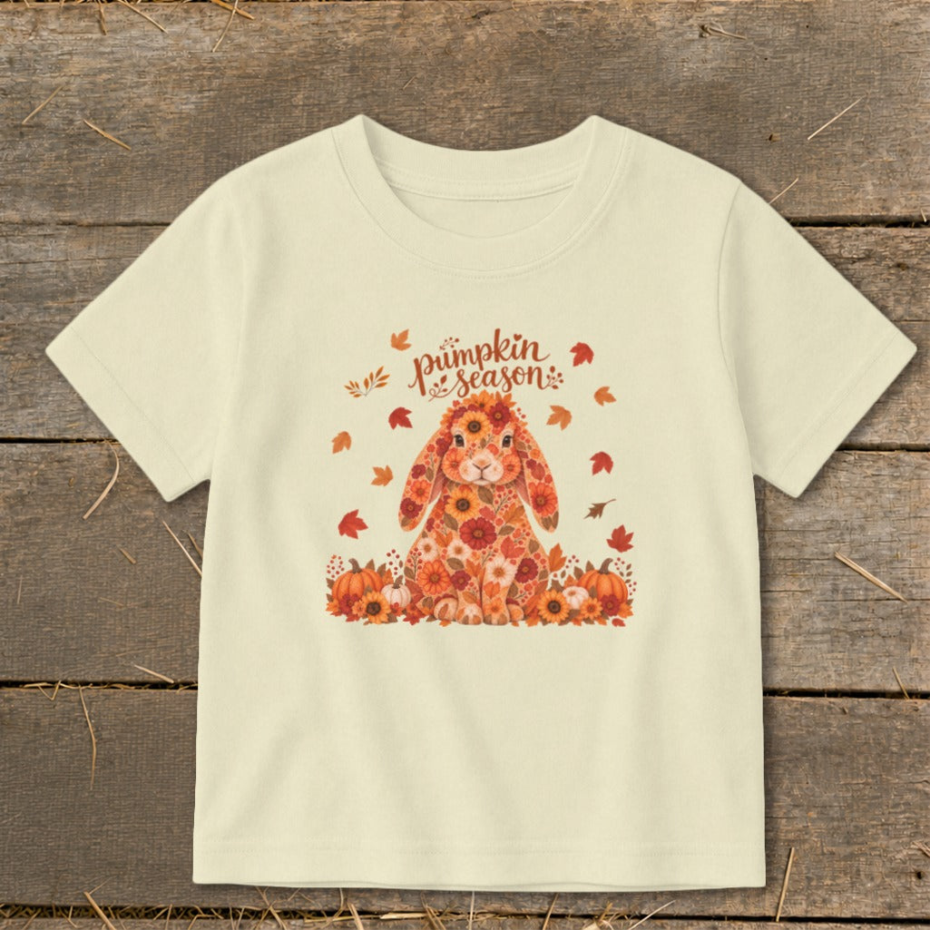 Cream t-shirt with floral bunny and "pumpkin season" text.