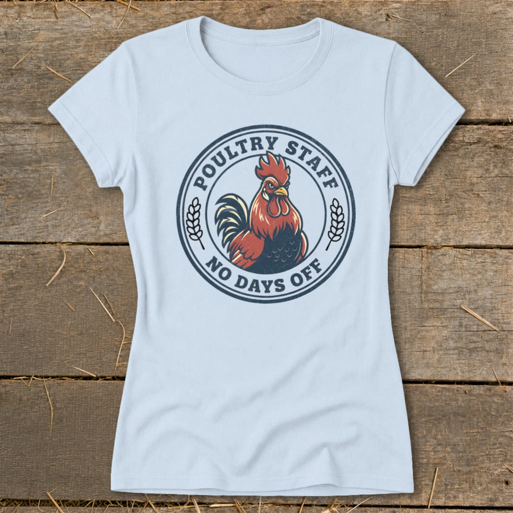Light blue t-shirt with a circular graphic featuring a rooster and text.