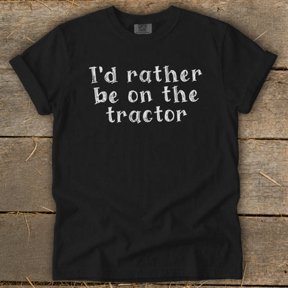 Black t-shirt with white text: "I'd rather be on the tractor."