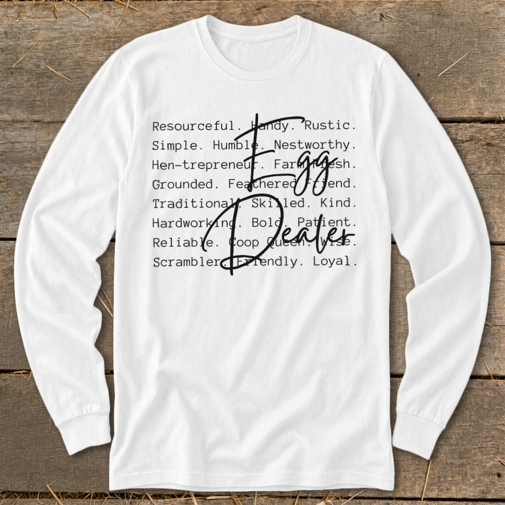 White long-sleeve shirt with "Egg Dealer" text and descriptive words.