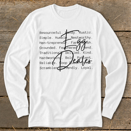 White long-sleeve shirt with "Egg Dealer" text and descriptive words.