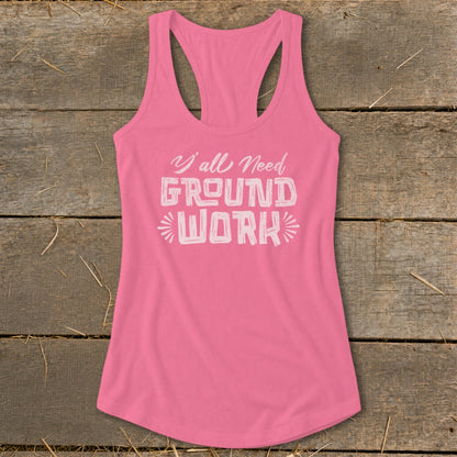 Pink tank top with "Y'all Need GROUND WORK" text in distressed white.