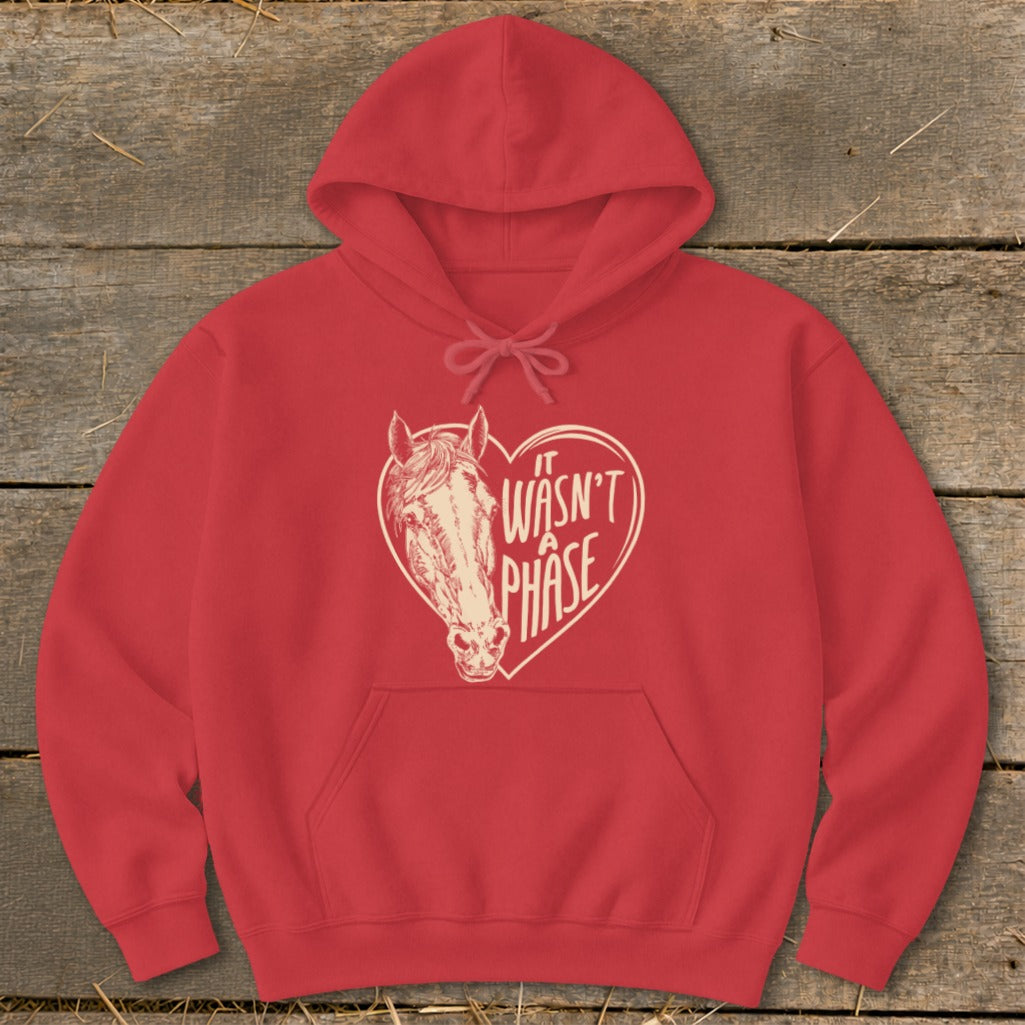 Red hoodie with a horse head inside a heart that says "It Wasn't A Phase."