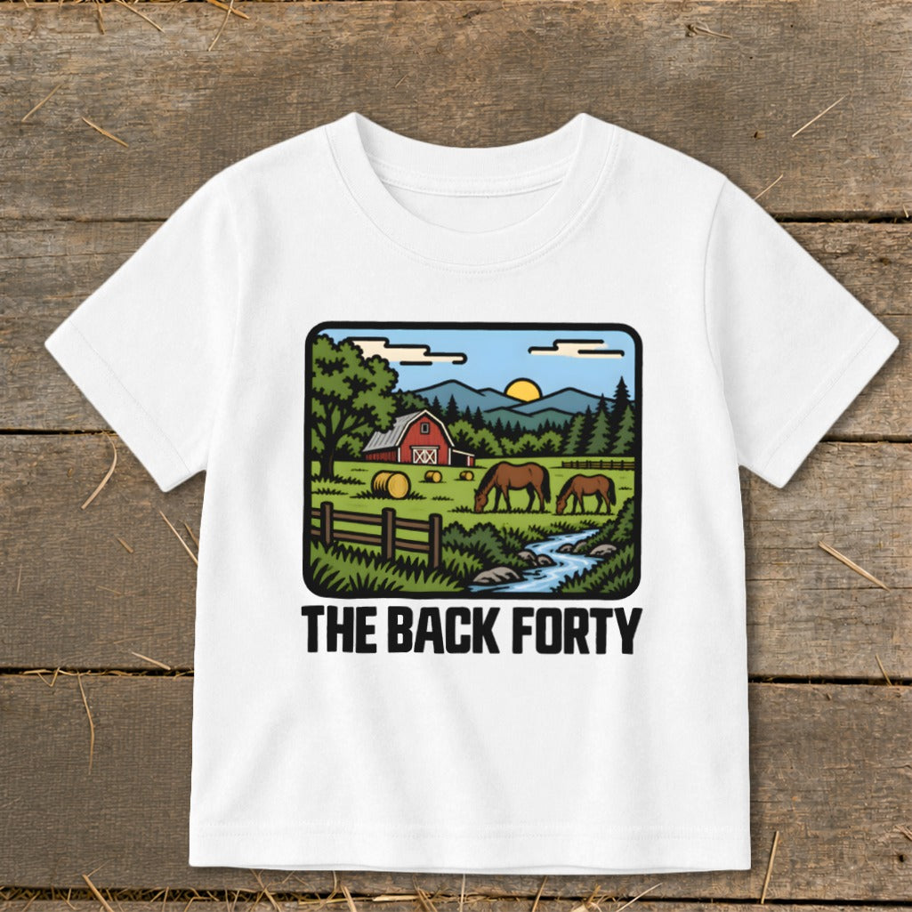 A white t-shirt featuring a retro farm graphic with two horses, a red barn, and the text The Back Forty.
