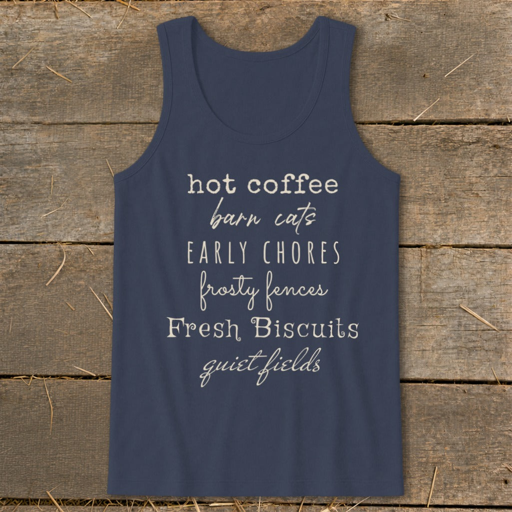 Navy tank top with text listing "hot coffee, barn cats, EARLY CHORES, frosty fences, Fresh Biscuits, quiet fields."