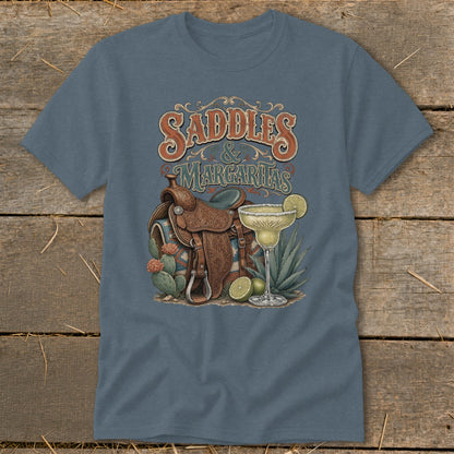 T-shirt graphic with "Saddles & Margaritas" text, saddle, cacti, and margarita.
