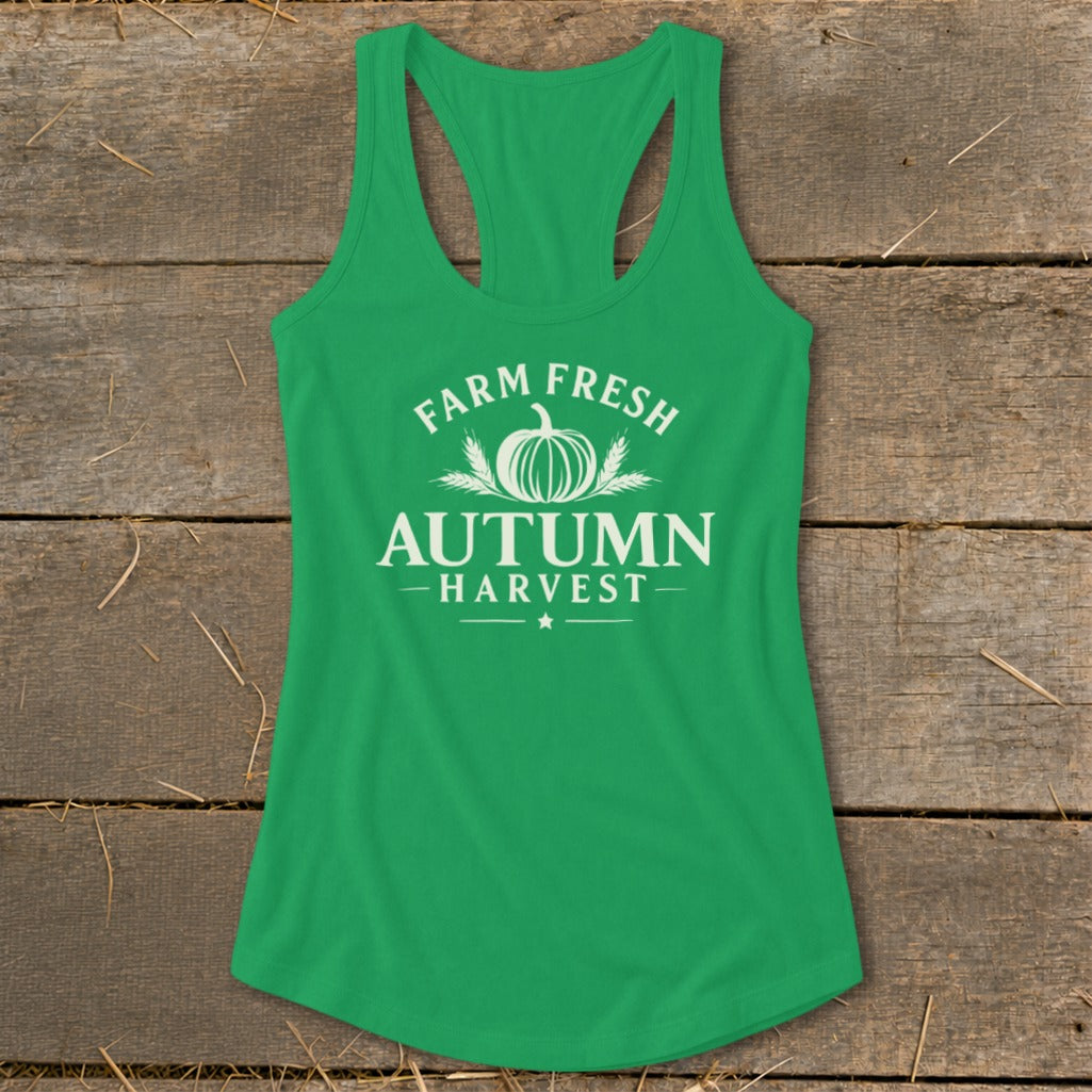 Green tank top with white text "Farm Fresh Autumn Harvest" and pumpkin graphic.