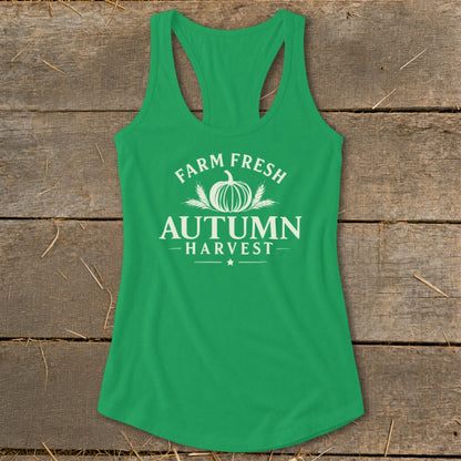Green tank top with white text "Farm Fresh Autumn Harvest" and pumpkin graphic.