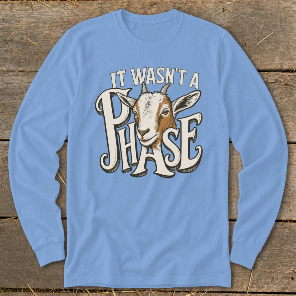 Light blue long sleeve t-shirt with goat and text "IT WASN'T A PHASE".