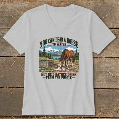 Light gray v-neck t-shirt featuring graphic text and an illustration of a horse drinking from a puddle.