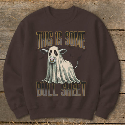 Brown sweatshirt with ghost cow and text "This Is Some Bull Sheet".