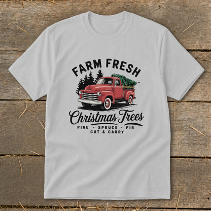 Red vintage truck carrying Christmas trees with "Farm Fresh Christmas Trees" text.