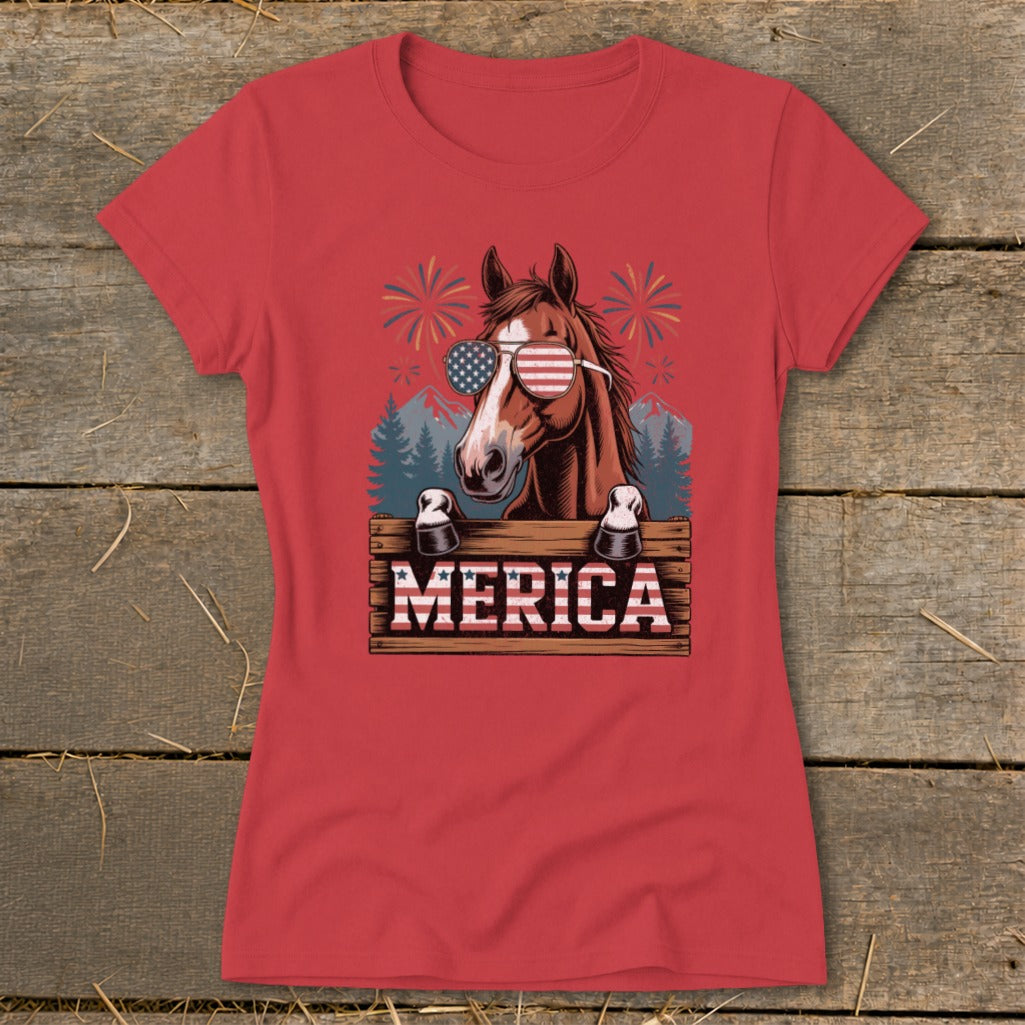 Horse wearing American flag sunglasses behind a "MERICA" sign with fireworks.