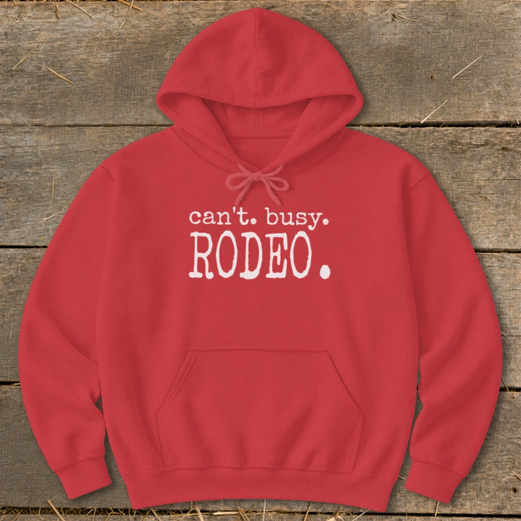 Red hoodie with "can't. busy. RODEO." graphic print on chest.