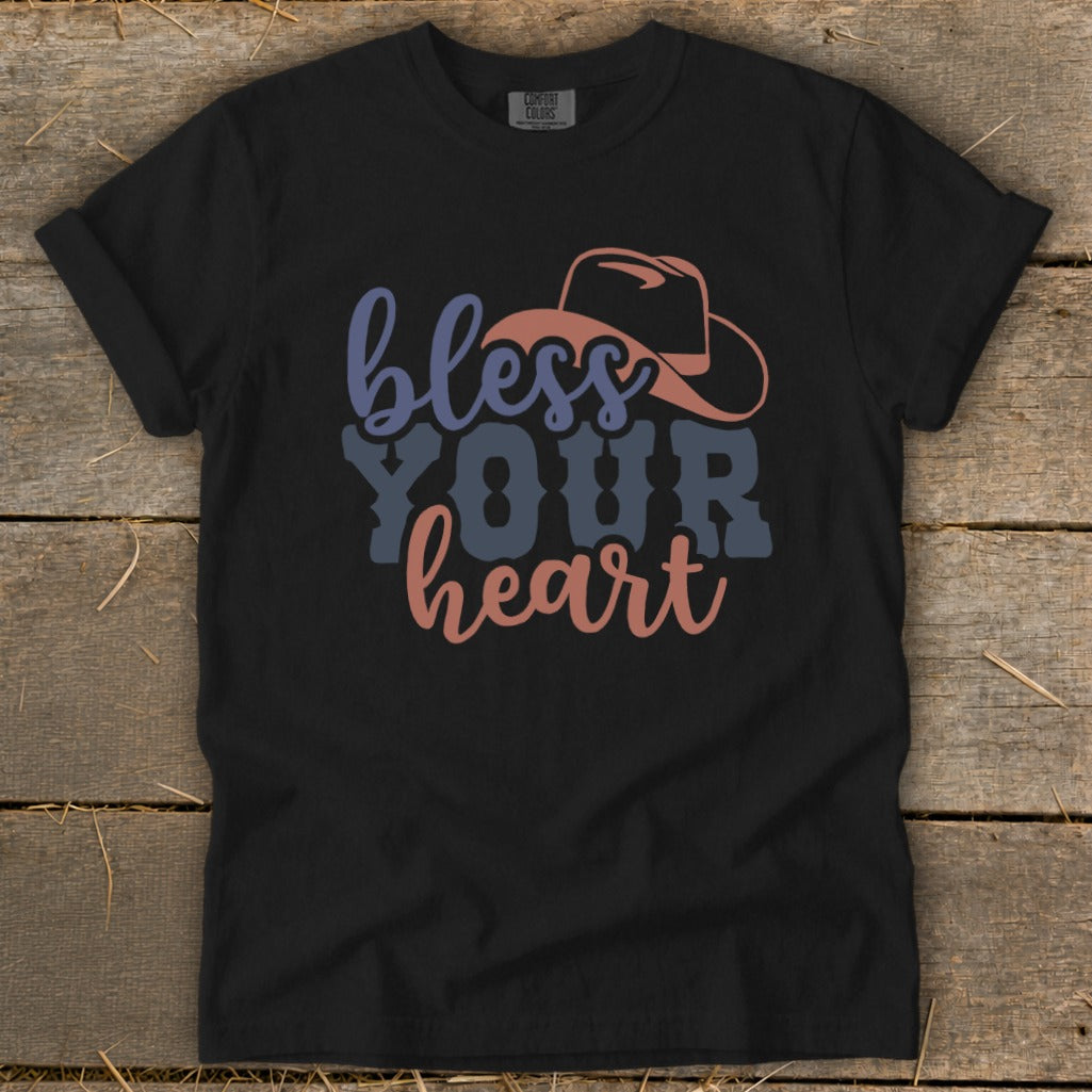 Black t-shirt with "bless YOUR heart" text and cowboy hat graphic.