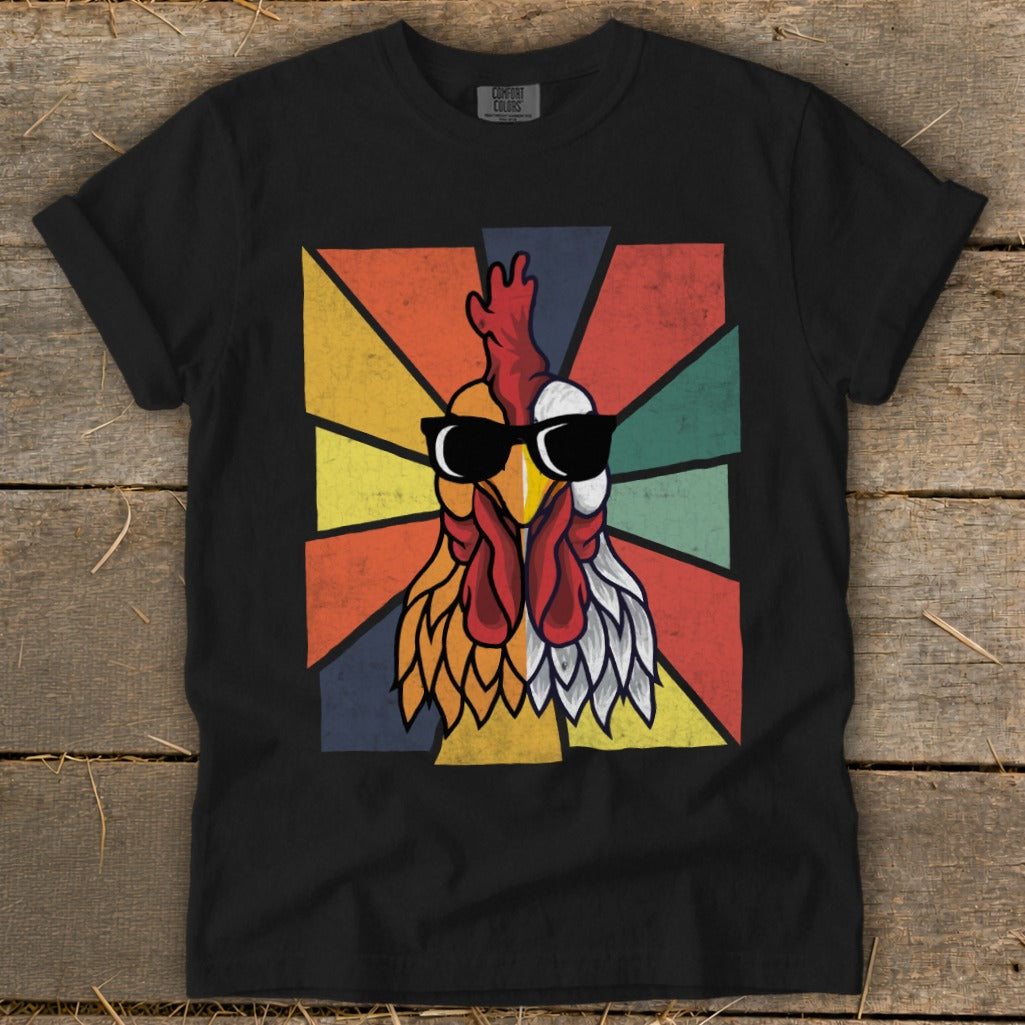 Black t-shirt with a retro graphic of a rooster wearing sunglasses.