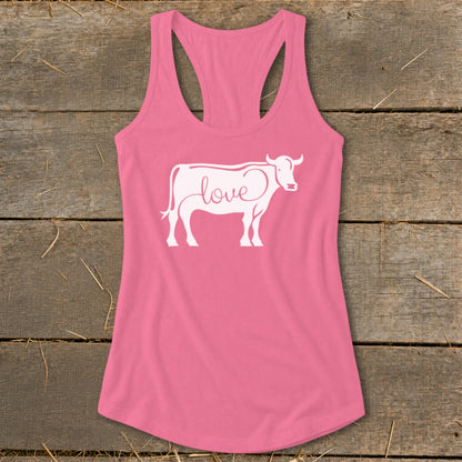 Pink tank top with a white outline of a cow containing the word "love" in cursive.