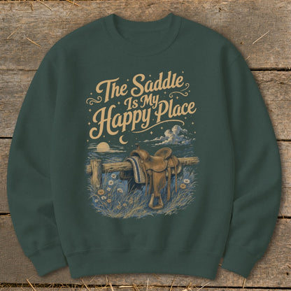 Dark green sweatshirt with "The Saddle Is My Happy Place" text and a saddle on a fence.
