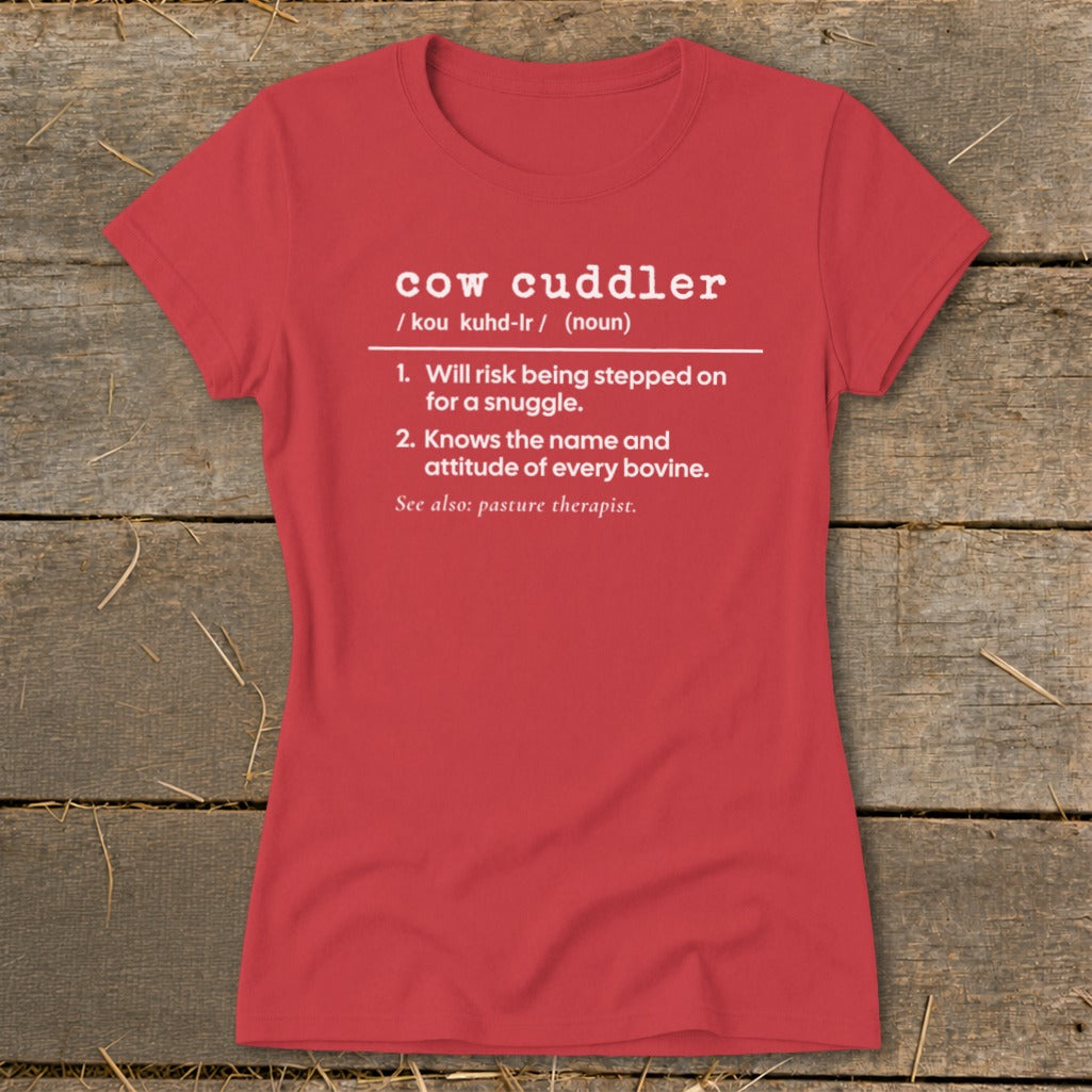 Red t-shirt with "cow cuddler" definition: 1. Will risk being stepped on for a snuggle. 2. Knows the name and attitude of every bovine.