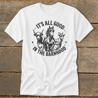 White t-shirt with black graphic of farm animals wearing sunglasses and text "It's all good in the Barnhood".